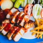 Pork steak and vegetable salad put in the event