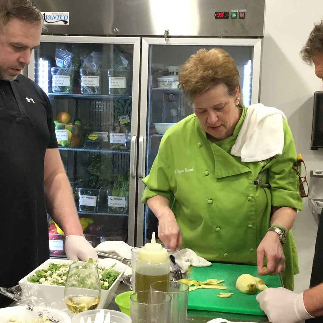 One of our world-class Atlanta cooking class instructors with participants.